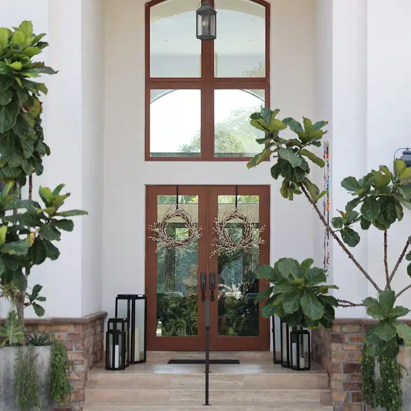 Wood French doors with transom window