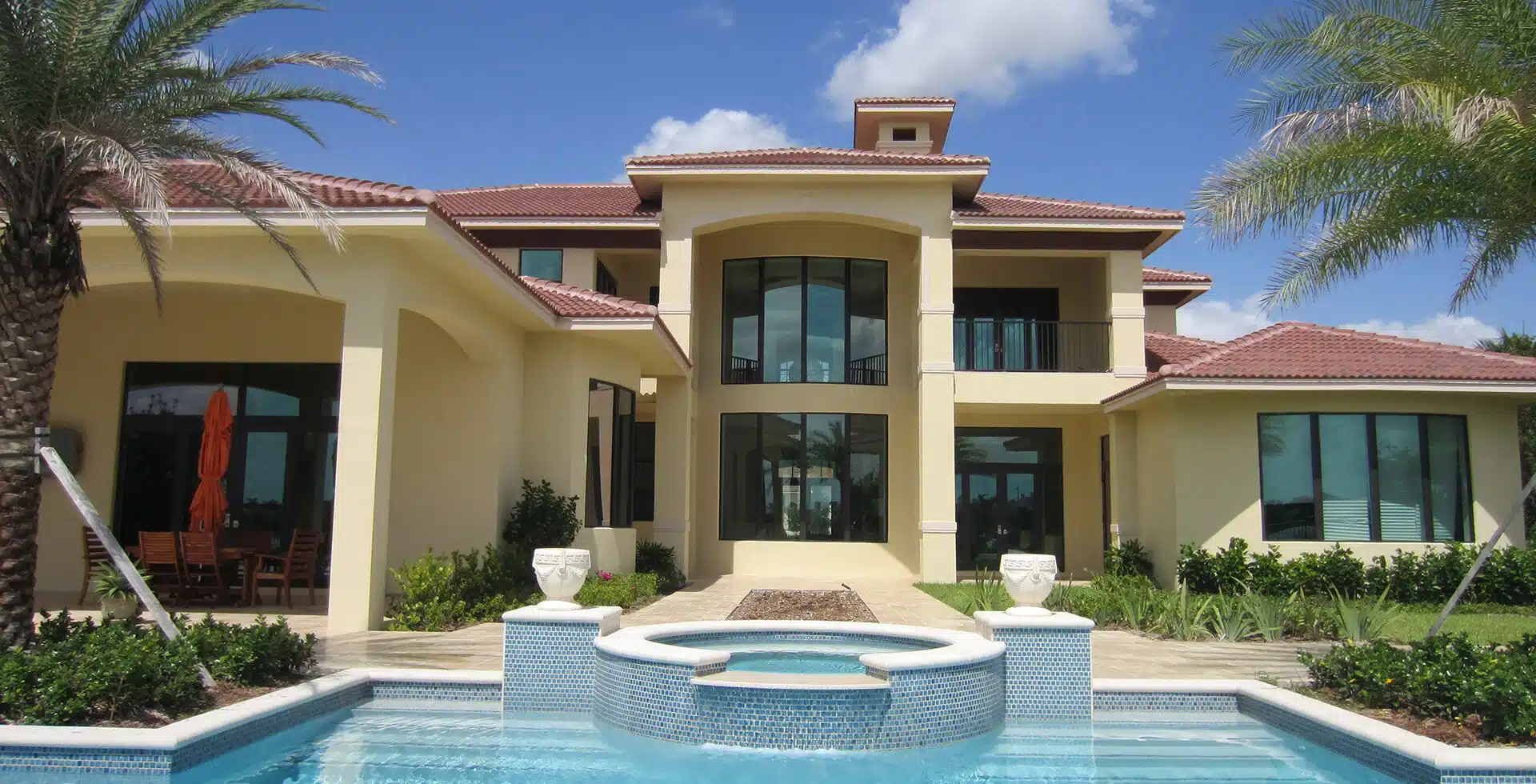 Mediterranean pool villa with impact windows and doors